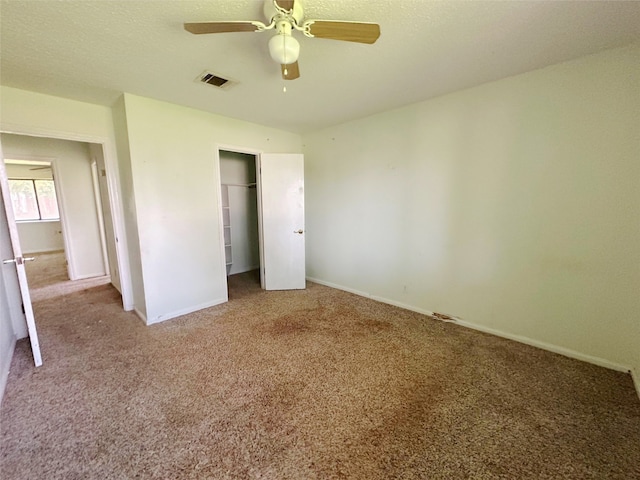 288 Twin Lakes Blvd W, West Columbia, TX 77486 - unfurnished bedroom with light carpet, a closet, and ceiling fan