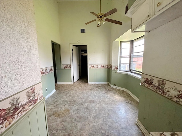 288 Twin Lakes Blvd W, West Columbia, TX 77486 - spare room with ceiling fan and a high ceiling