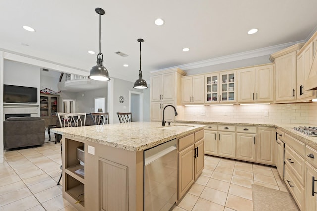 28632 Beth Marie, Magnolia, TX 77355 - kitchen with appliances with stainless steel finishes, light tile patterned flooring, recessed lighting, an island with sink, and decorative backsplash