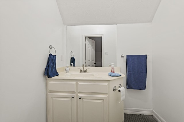 28632 Beth Marie, Magnolia, TX 77355 - bathroom featuring vanity and baseboards