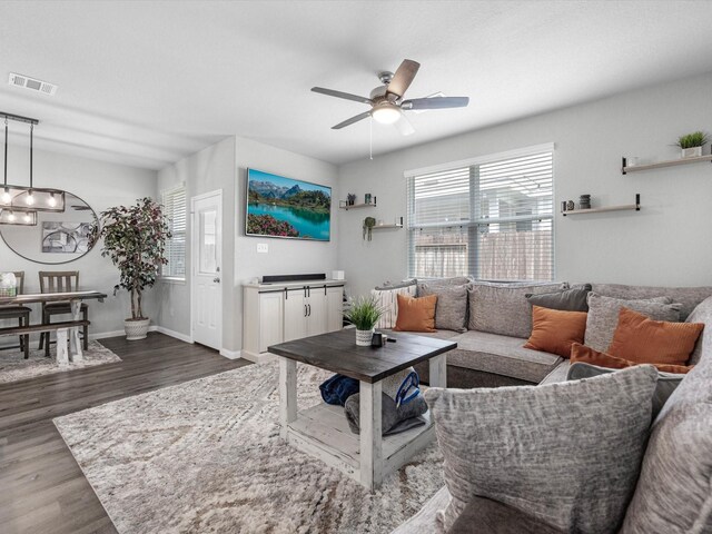 22010 Great Royal Ln, Houston, TX 77073 - living room with a ceiling fan and dark wood finished floors