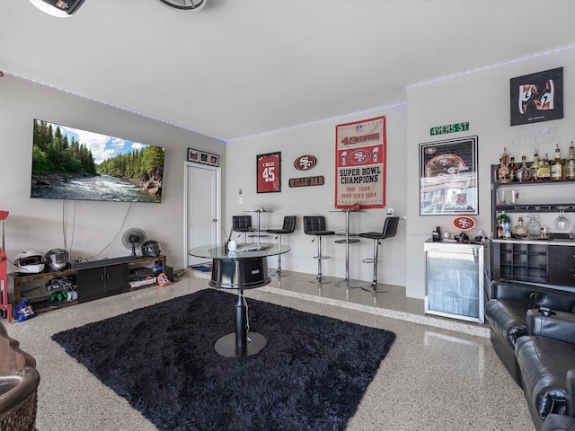 22010 Great Royal Ln, Houston, TX 77073 - living area featuring speckle patterned floor and a dry bar