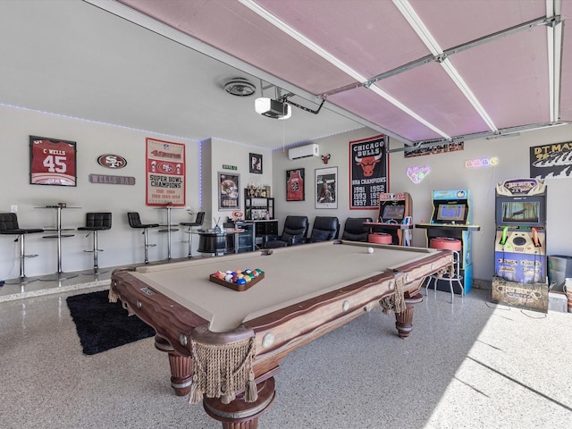 22010 Great Royal Ln, Houston, TX 77073 - rec room featuring speckled floor, pool table, and an AC wall unit