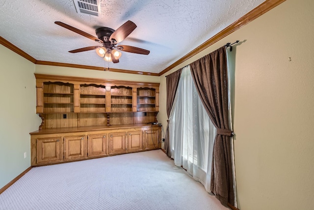20746 Prince Creek Dr, Katy, TX 77450 - unfurnished room featuring light carpet, a textured ceiling, a ceiling fan, and ornamental molding