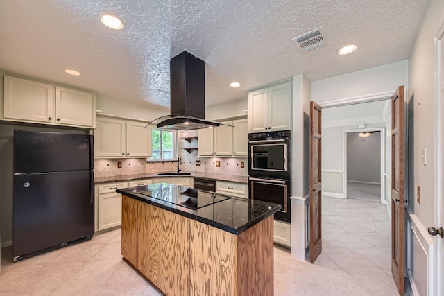 20746 Prince Creek Dr, Katy, TX 77450 - kitchen with black appliances, island range hood, a center island, backsplash, and light tile patterned flooring