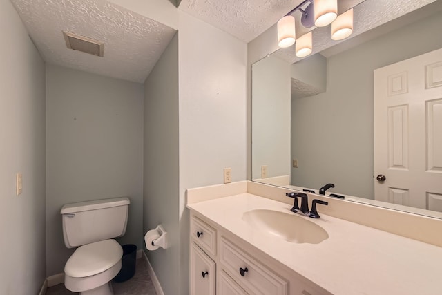 20746 Prince Creek Dr, Katy, TX 77450 - bathroom with a textured ceiling, vanity, and tile patterned flooring