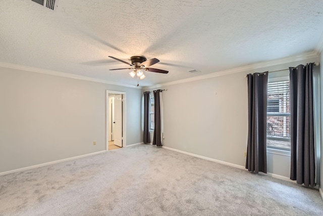20746 Prince Creek Dr, Katy, TX 77450 - unfurnished room featuring ceiling fan, light colored carpet, a textured ceiling, and ornamental molding