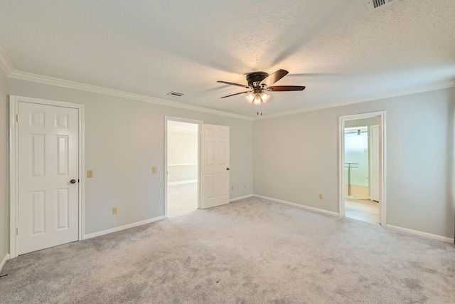 20746 Prince Creek Dr, Katy, TX 77450 - unfurnished bedroom featuring light carpet, ornamental molding, a textured ceiling, ensuite bath, and ceiling fan