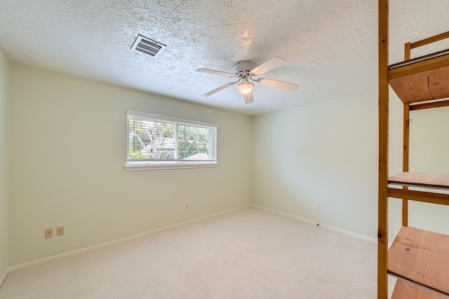 20746 Prince Creek Dr, Katy, TX 77450 - unfurnished bedroom featuring carpet floors, ceiling fan, and a textured ceiling