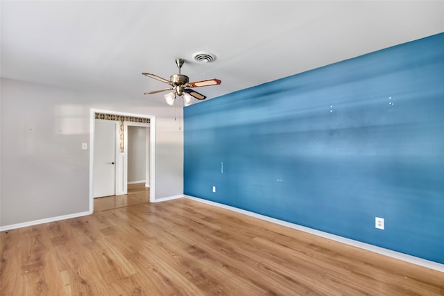 1015 Stevens Ave, Conroe, TX 77301 - spare room featuring ceiling fan and wood finished floors