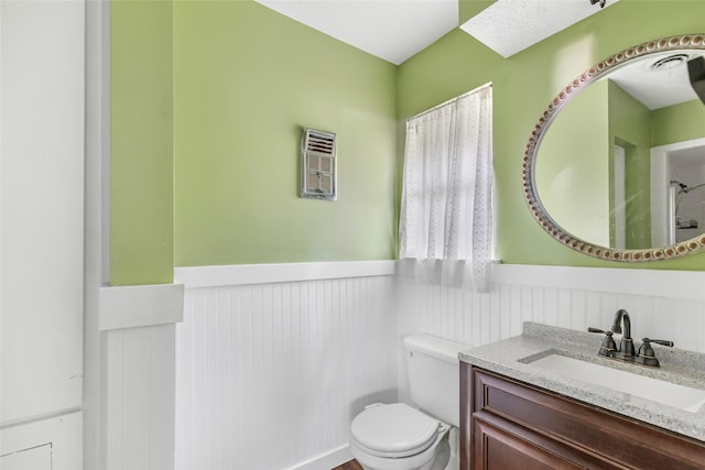1015 Stevens Ave, Conroe, TX 77301 - bathroom with a wainscoted wall and vanity
