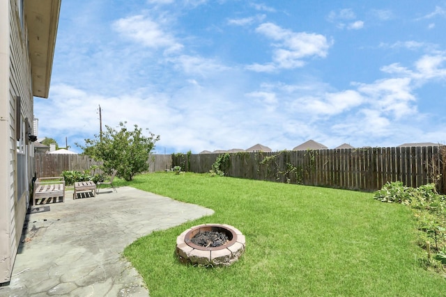 16227 Affirmed Way, Friendswood, TX 77546 - fenced backyard featuring a patio area and a fire pit