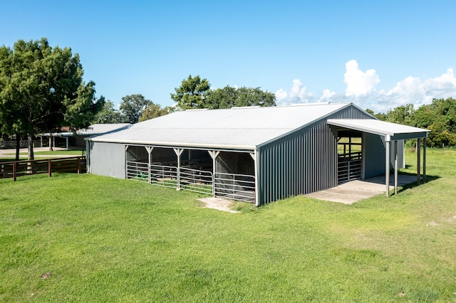 4821 Lawrence Rd, Baytown, TX 77523 - view of outbuilding featuring an exterior structure and a carport