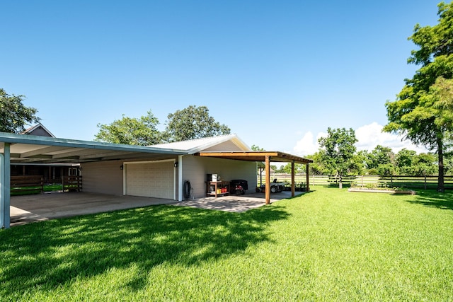 4821 Lawrence Rd, Baytown, TX 77523 - view of yard featuring a garage