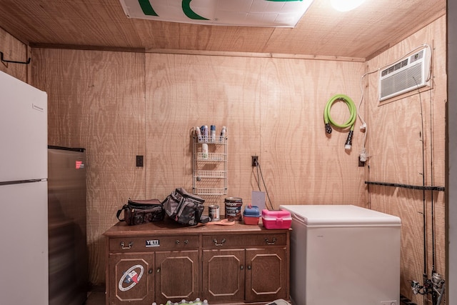 4821 Lawrence Rd, Baytown, TX 77523 - laundry area with a wall mounted air conditioner and wooden walls