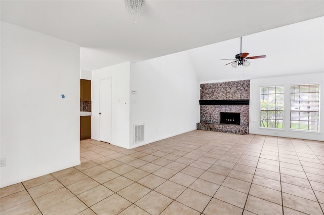 4719 Silver Frost Dr, Houston, TX 77066 - unfurnished living room featuring lofted ceiling, a ceiling fan, a large fireplace, and light tile patterned floors