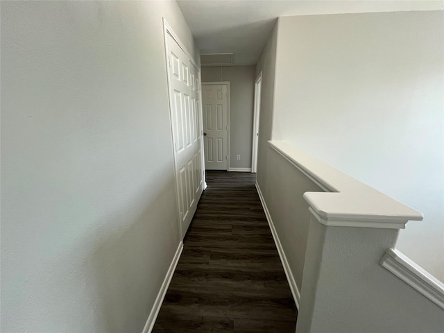 28911 W Pecos River Ct, Spring, TX 77386 - hall with baseboards and dark wood-type flooring