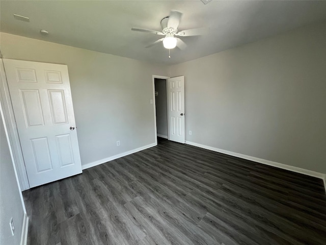 28911 W Pecos River Ct, Spring, TX 77386 - unfurnished bedroom with dark wood-style floors and a ceiling fan