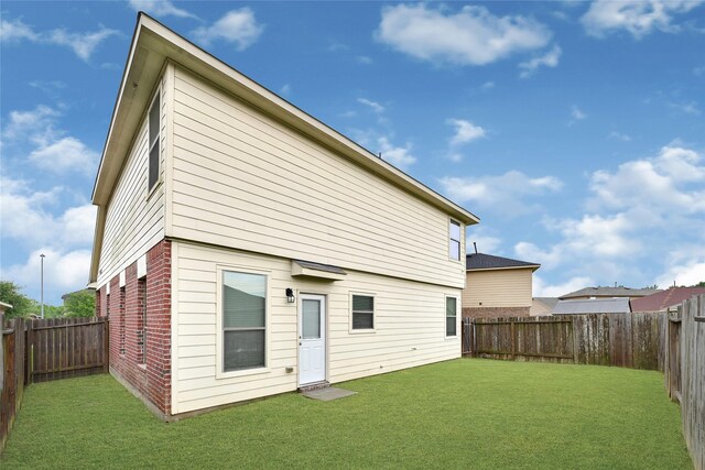 1611 Jaquima Valley Way, Houston, TX 77049 - back of property with brick siding and a fenced backyard