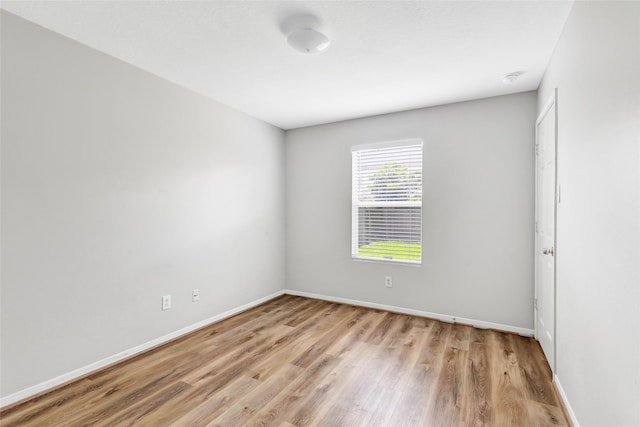 5019 Packard Elm Ct, Katy, TX 77449 - unfurnished room with light wood finished floors and baseboards