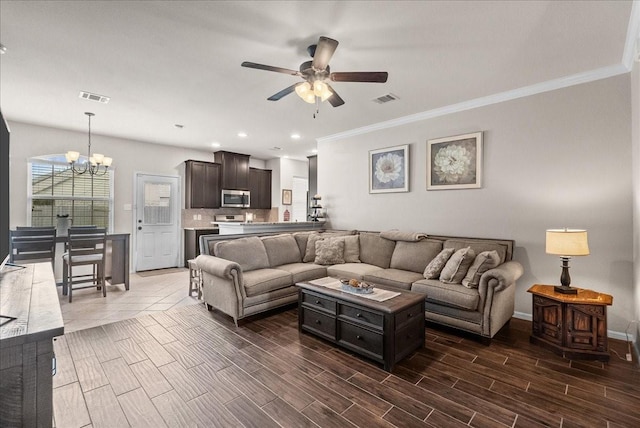 13203 Adolpho Dr, Houston, TX 77044 - living area with a chandelier, ceiling fan, wood finish floors, crown molding, and recessed lighting