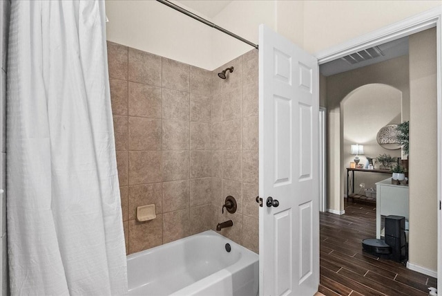 13203 Adolpho Dr, Houston, TX 77044 - full bath featuring shower / bathtub combination with curtain and wood finish floors