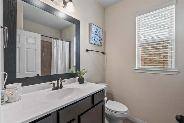 13203 Adolpho Dr, Houston, TX 77044 - bathroom with healthy amount of natural light, vanity, and a shower with curtain