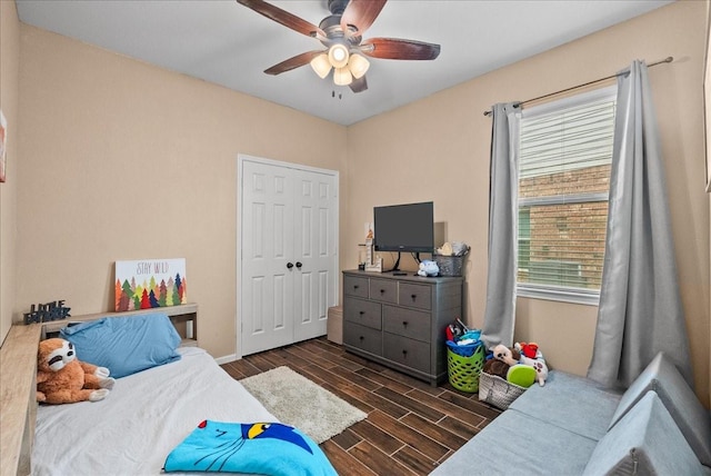 13203 Adolpho Dr, Houston, TX 77044 - bedroom with dark wood-style flooring, a closet, and ceiling fan