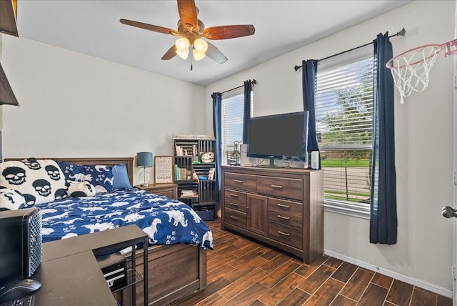 13203 Adolpho Dr, Houston, TX 77044 - bedroom featuring dark wood-style flooring and ceiling fan