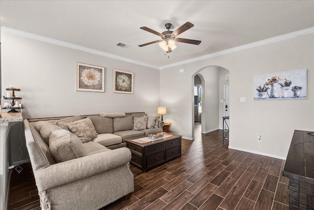 13203 Adolpho Dr, Houston, TX 77044 - living area with arched walkways, a ceiling fan, ornamental molding, and dark wood-style floors