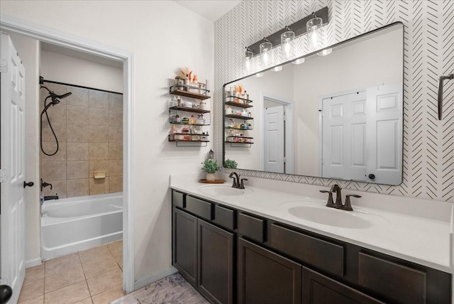 13203 Adolpho Dr, Houston, TX 77044 - full bathroom featuring double vanity, tile patterned flooring, wallpapered walls, and shower / bathtub combination
