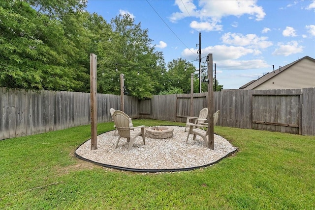 13203 Adolpho Dr, Houston, TX 77044 - fenced backyard with an outdoor fire pit and a patio
