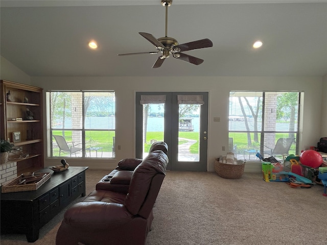 11391 Lakeshore Dr, Thornton, TX 76687 - carpeted living room featuring lofted ceiling, ceiling fan, and recessed lighting