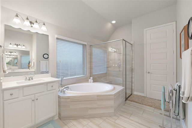 23649 Sage Villa Dr, New Caney, TX 77357 - full bath with vanity, a bath, a shower stall, lofted ceiling, and tile patterned floors