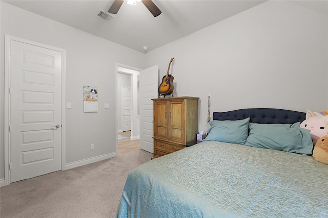 23649 Sage Villa Dr, New Caney, TX 77357 - bedroom with light carpet and a ceiling fan