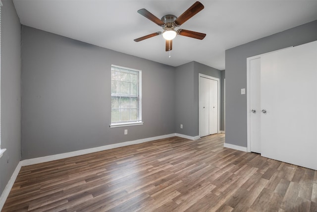 1204 Crescent Blvd, Cleveland, TX 77327 - unfurnished bedroom featuring wood finished floors, a closet, and ceiling fan