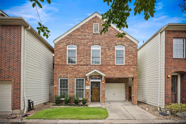 1773 Aden Dr, Houston, TX 77003 - view of front of house with brick siding, an attached garage, and driveway