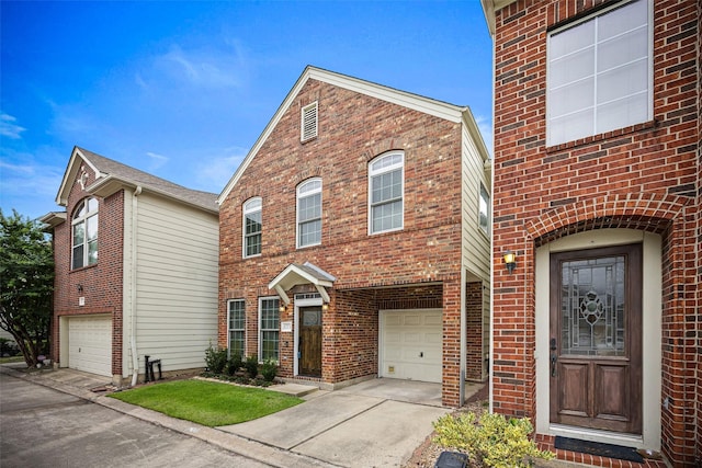 1773 Aden Dr, Houston, TX 77003 - view of front of house featuring an attached garage, brick siding, and concrete driveway