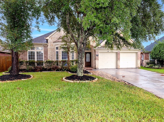 6111 Windsor Chase Ln, League City, TX 77573 - view of front of property featuring stone siding, driveway, and an attached garage