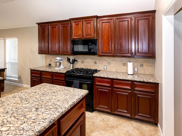 6111 Windsor Chase Ln, League City, TX 77573 - kitchen with black appliances, decorative backsplash, light tile patterned floors, light stone countertops, and reddish brown cabinets