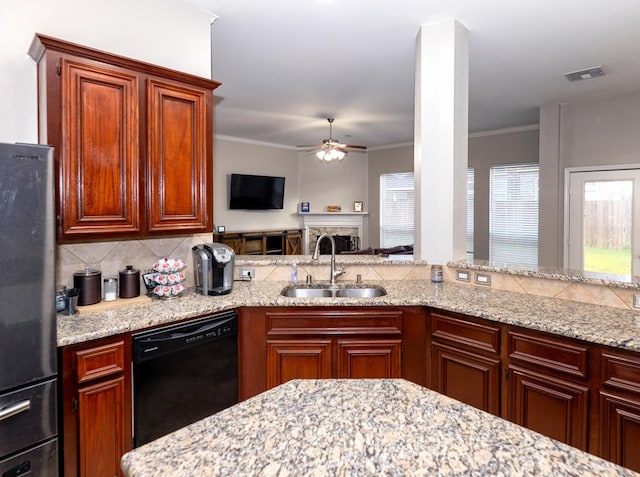 6111 Windsor Chase Ln, League City, TX 77573 - kitchen featuring black dishwasher, freestanding refrigerator, a ceiling fan, tasteful backsplash, and crown molding