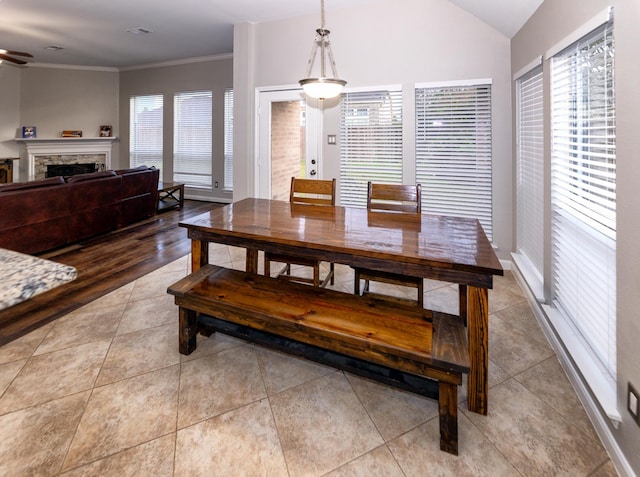 6111 Windsor Chase Ln, League City, TX 77573 - dining space with healthy amount of natural light, a ceiling fan, light tile patterned floors, and vaulted ceiling