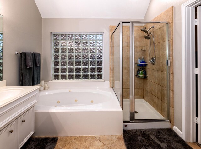 6111 Windsor Chase Ln, League City, TX 77573 - bathroom with a whirlpool tub, vanity, a shower stall, tile patterned floors, and vaulted ceiling