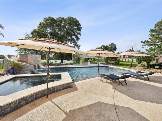 2700 Spurlock Rd, Nederland, TX 77627 - outdoor pool with a patio