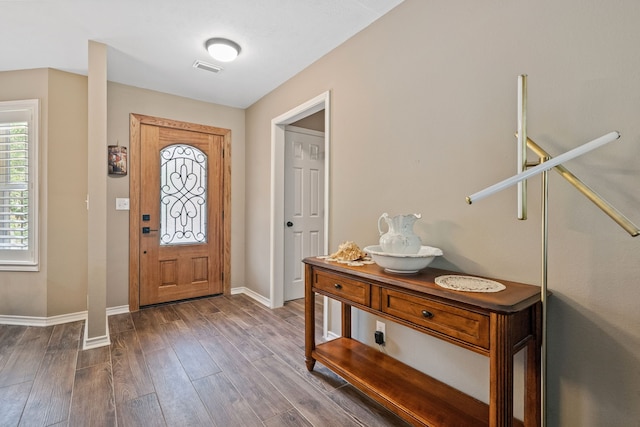 4920 Fm 350 N, Livingston, TX 77351 - entryway with baseboards and dark wood-type flooring