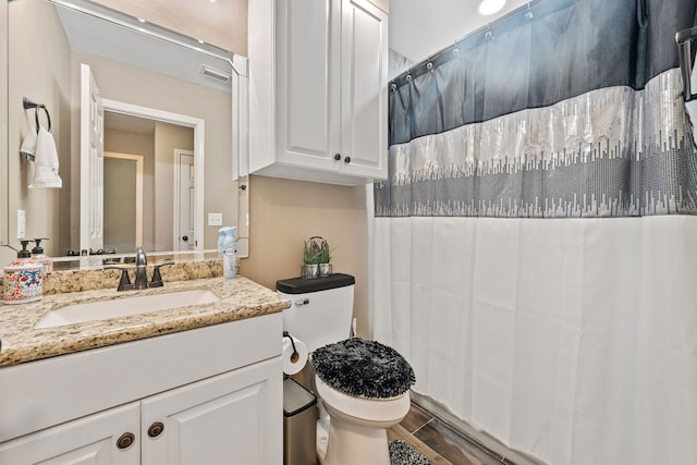 4920 Fm 350 N, Livingston, TX 77351 - bathroom with vanity, wood finished floors, and curtained shower
