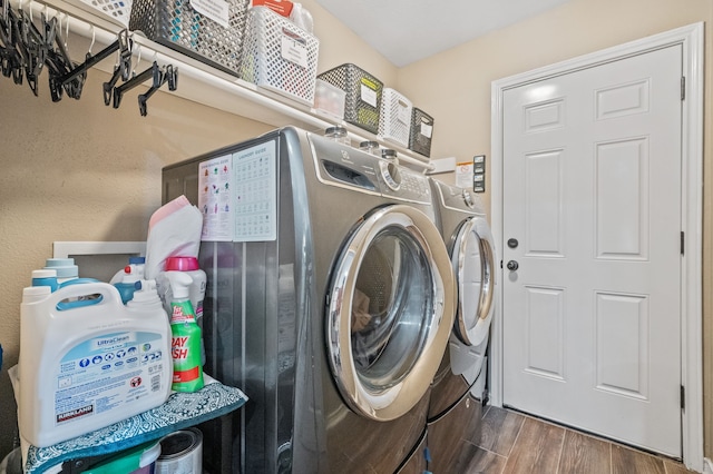 4920 Fm 350 N, Livingston, TX 77351 - washroom with washer and clothes dryer and wood finished floors