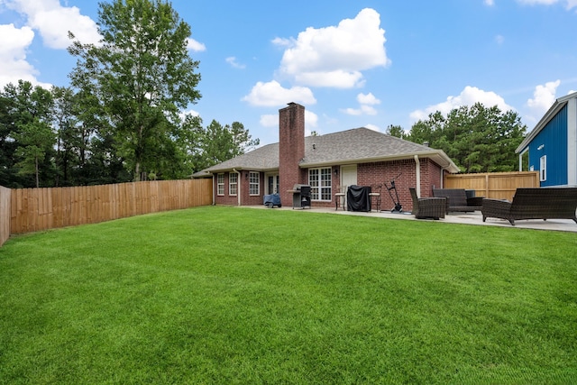 4920 Fm 350 N, Livingston, TX 77351 - rear view of house with an outdoor hangout area, a chimney, a fenced backyard, a patio area, and roof with shingles