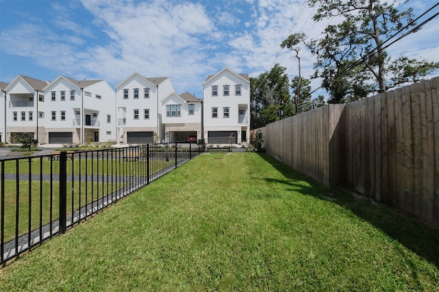 5502C Wheatley St, Houston, TX 77091 - view of yard featuring a residential view and a garage