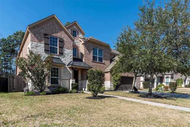 5002 Sawmill Terrace Ln, Spring, TX 77389 - view of front of house featuring a garage, a standing seam roof, stone siding, and brick siding